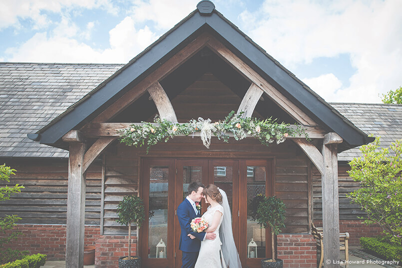 Lisa Howard Photography - Newlyweds At The Entrance