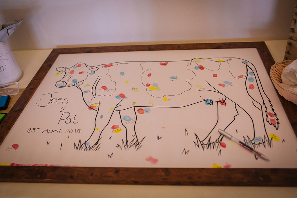 The couple chose a farming themed wedding message board at Sandhole Oak Barn in Cheshire