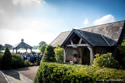 With views over the lake the Clock Tower at Sandhole Oak Barn is perfect for your outdoor wedding ceremony in Cheshire