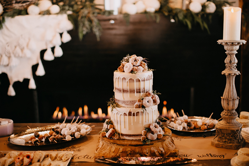 This semi naked drip cake would be a perfect choice for an autumn wedding at Sandhole Oak Barn