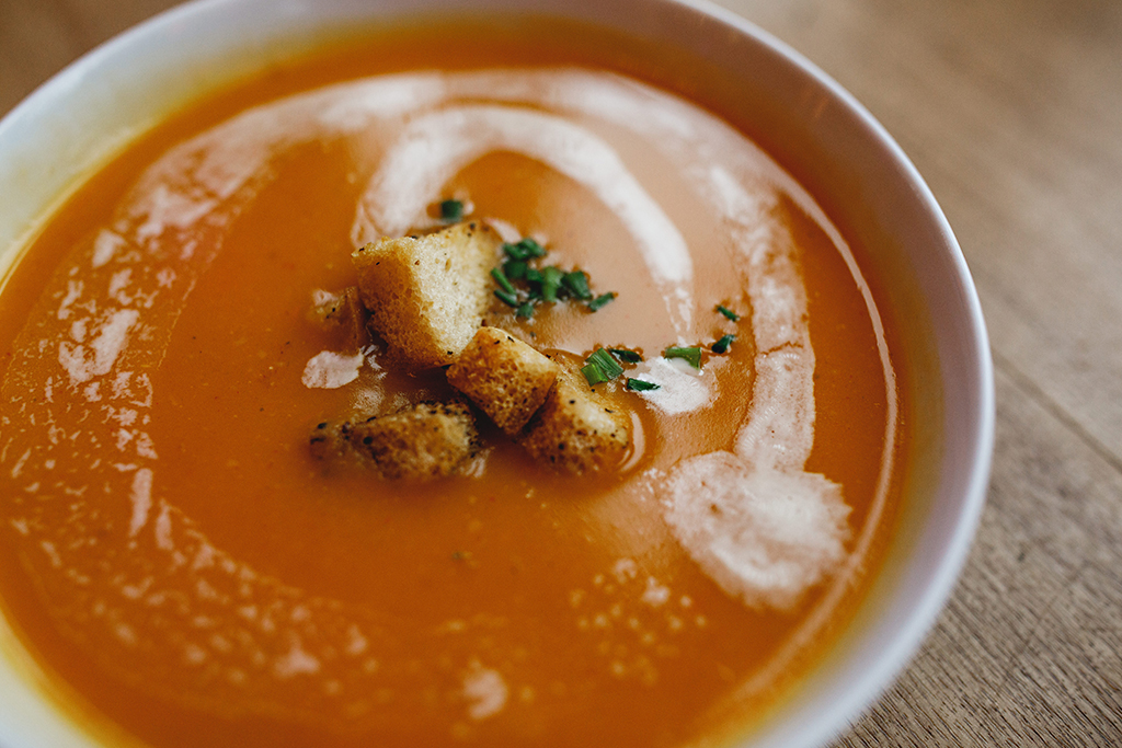 Warming honey roasted parsnip soup is great as a starter for your winter barn wedding in the North West