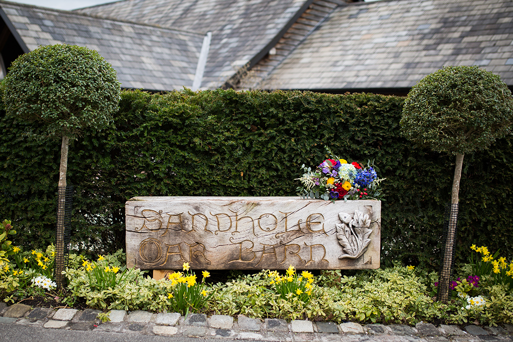 The couple chose bright and bold colours for their wedding and Sandhole Oak Barn