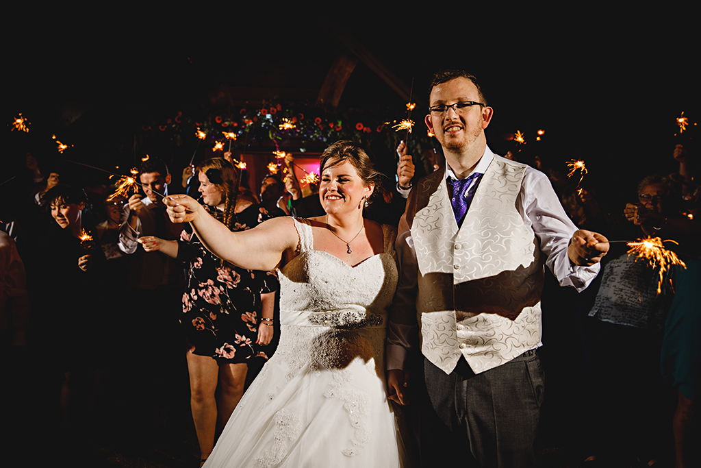 The bride and groom ended the evening perfectly with a sparkler send off at this barn venue in Cheshire